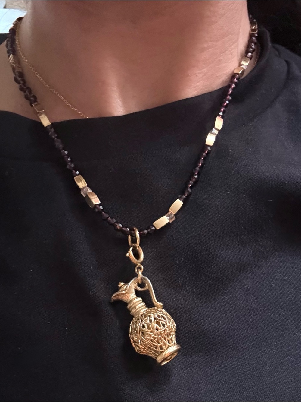 Handcrafted purple and gold beaded necklace with Gold Charm